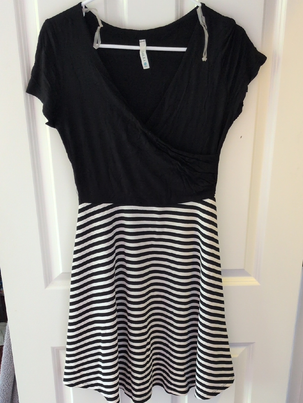 Gilli Black V-Neck Fit & Flare Mini Dress with Black-and-White Striped Skirt